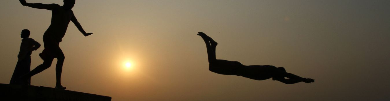 Jumping in The Ganga for a Holy Bath - Significant Landmark in Kashi, Varanasi